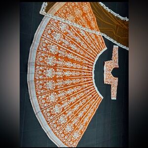 Orange Lehenga Choli - unstitched